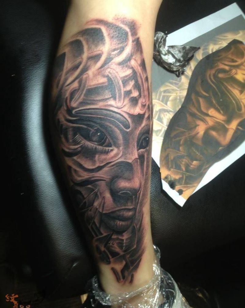 守望纹身图片_肖像腿部纹身图案