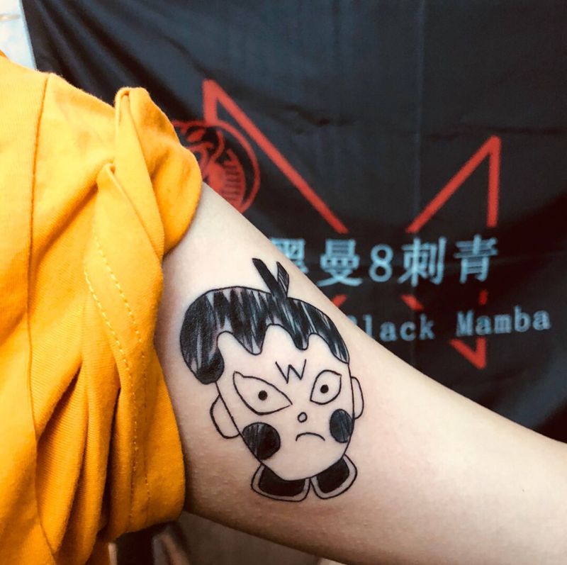 旺仔丑娃纹身图片_手臂涂鸦卡通纹身图案