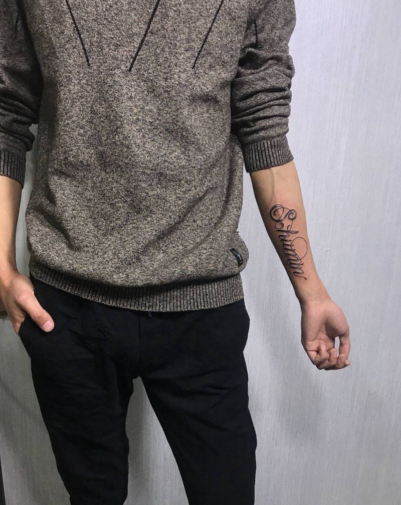 小手臂花体英文纹身图片_手部成品欧美字符英文纹身图案