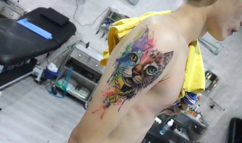 水彩大猫手臂纹身图片