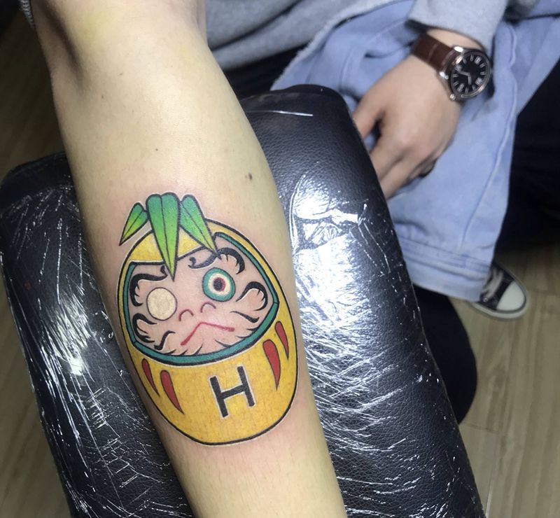 达摩蛋纹身图片_手臂纹身图案
