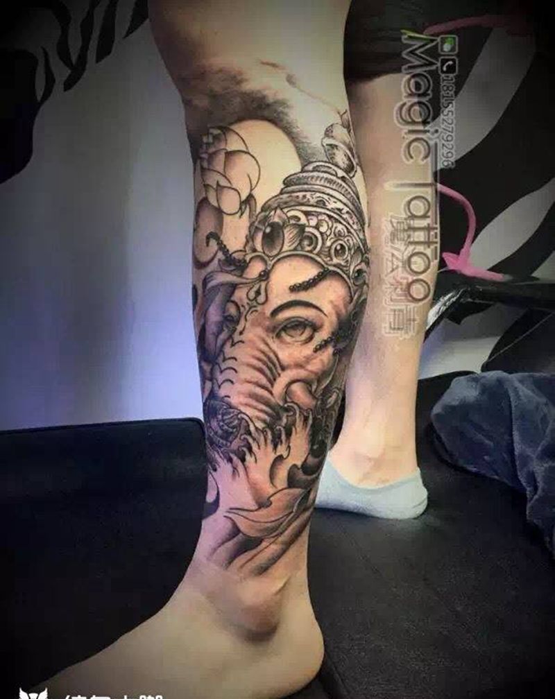 象神莲花包小腿纹身图片_腿部传统鬼神蚌埠纹身图案