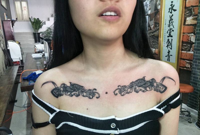 手枪纹身图片