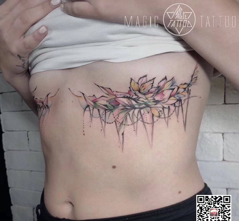 水墨花纹身图片_胸部水彩花纹身图案