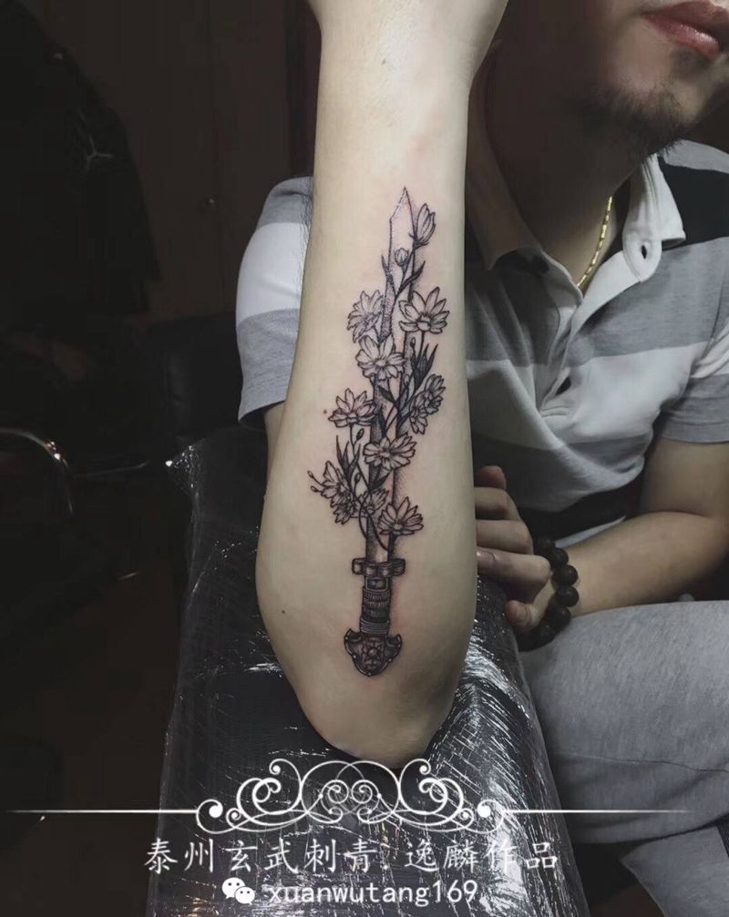 卓玛刀格桑花纹身图片