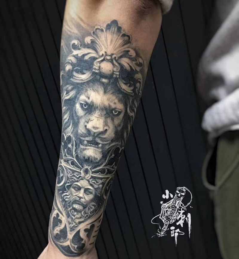 石雕欧美包小臂完工纹身图片_手臂欧美写实纹身图案