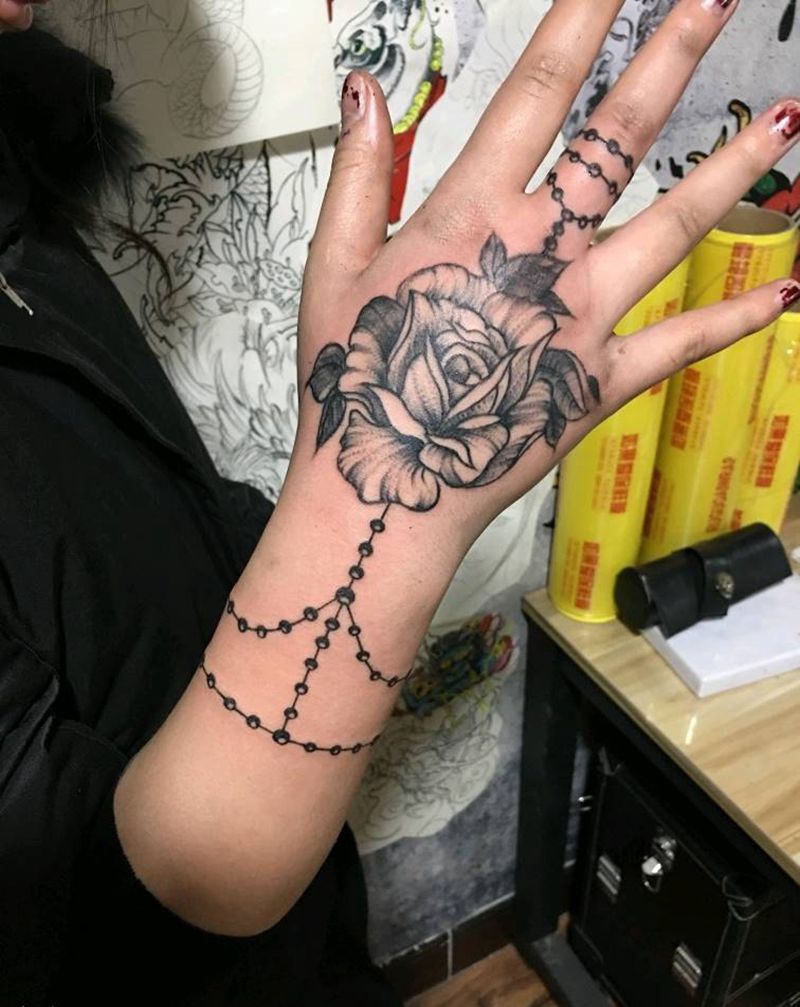 素花纹身图片_手部纹身图案