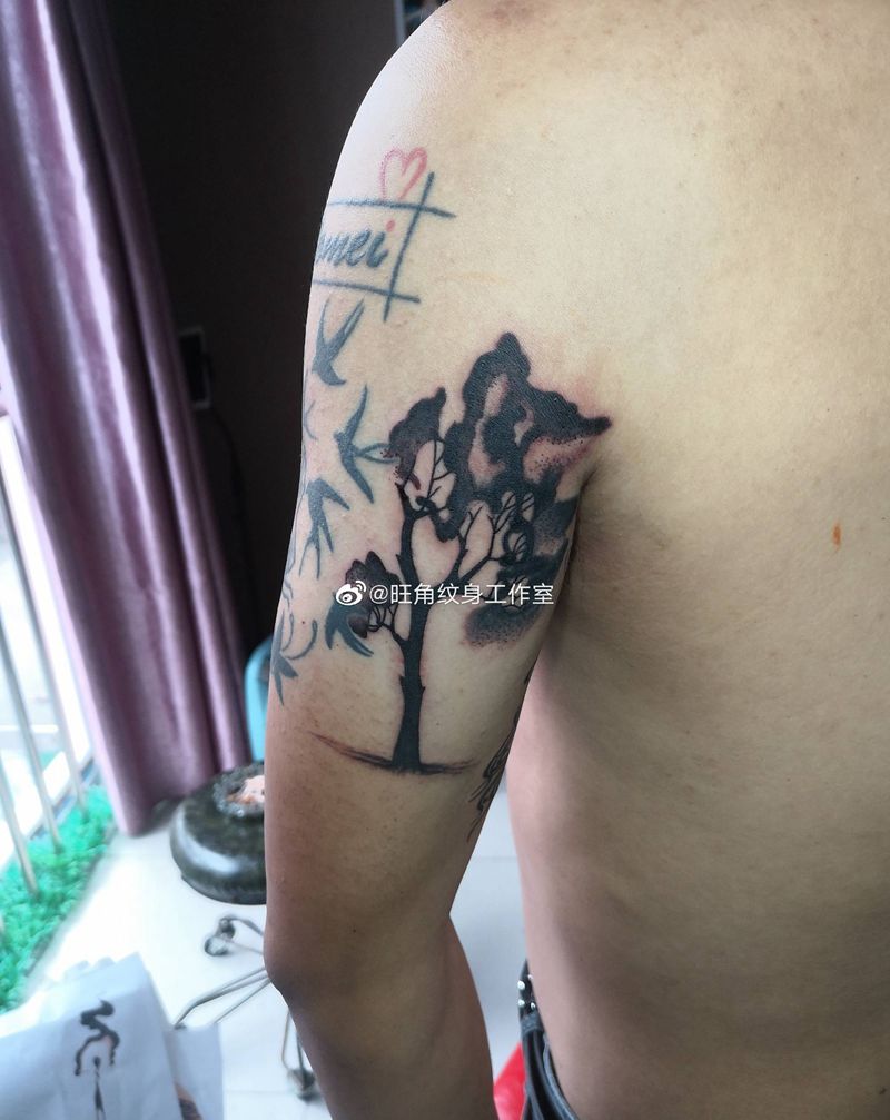 黑灰色彩纹身图片_手臂纹身图案