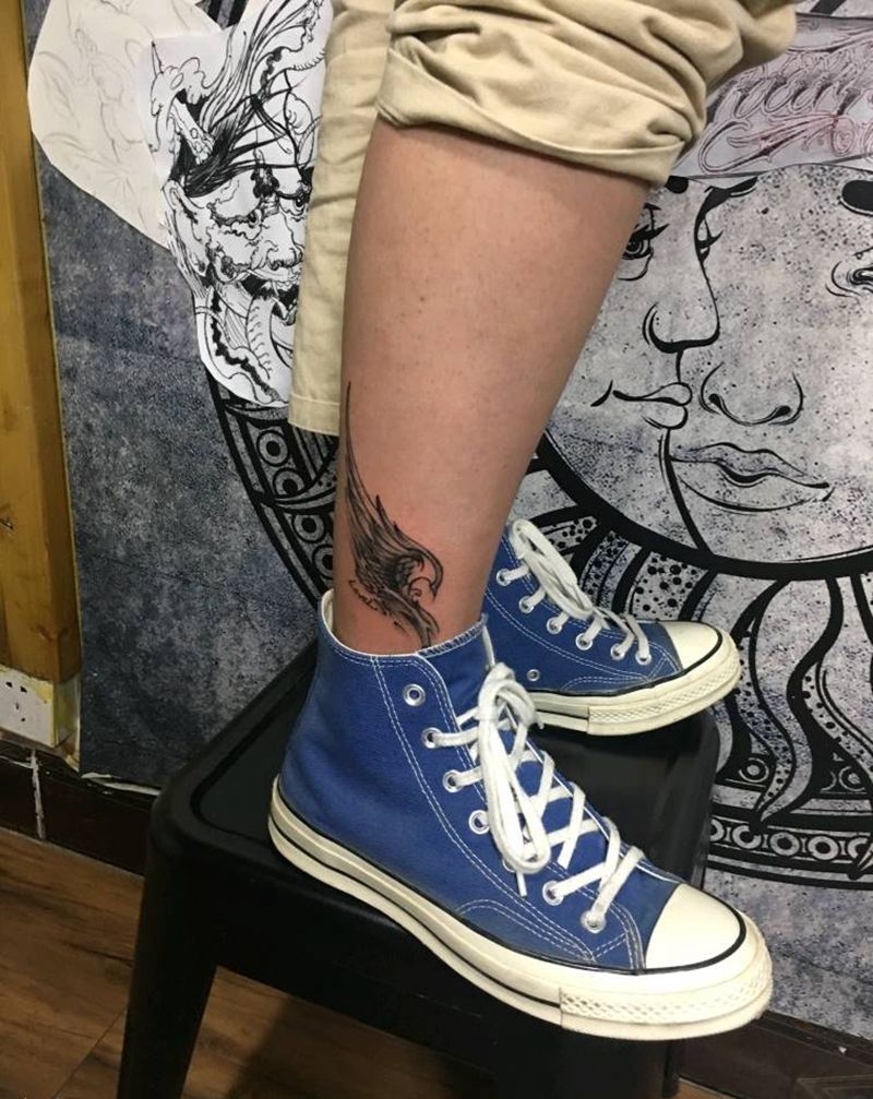 翅膀纹身图片_腿部纹身图案