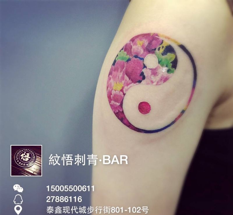 牡丹双鱼纹身图片