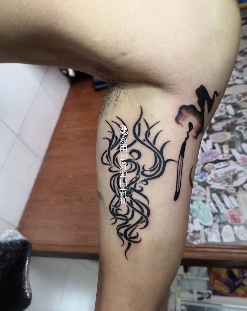 凤凰图腾纹身图片_手臂纹身图案