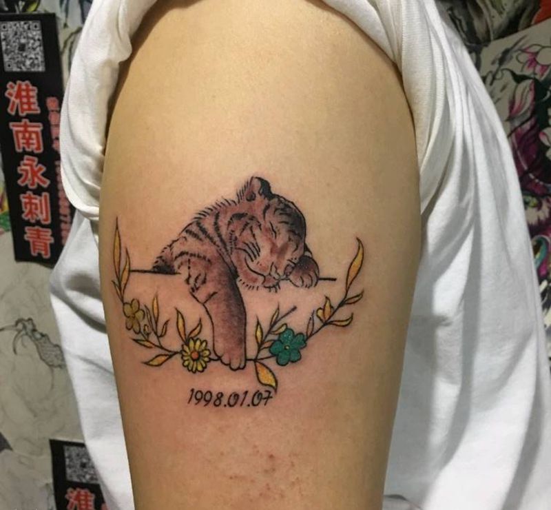 小老虎纹身图片_手臂纹身图案