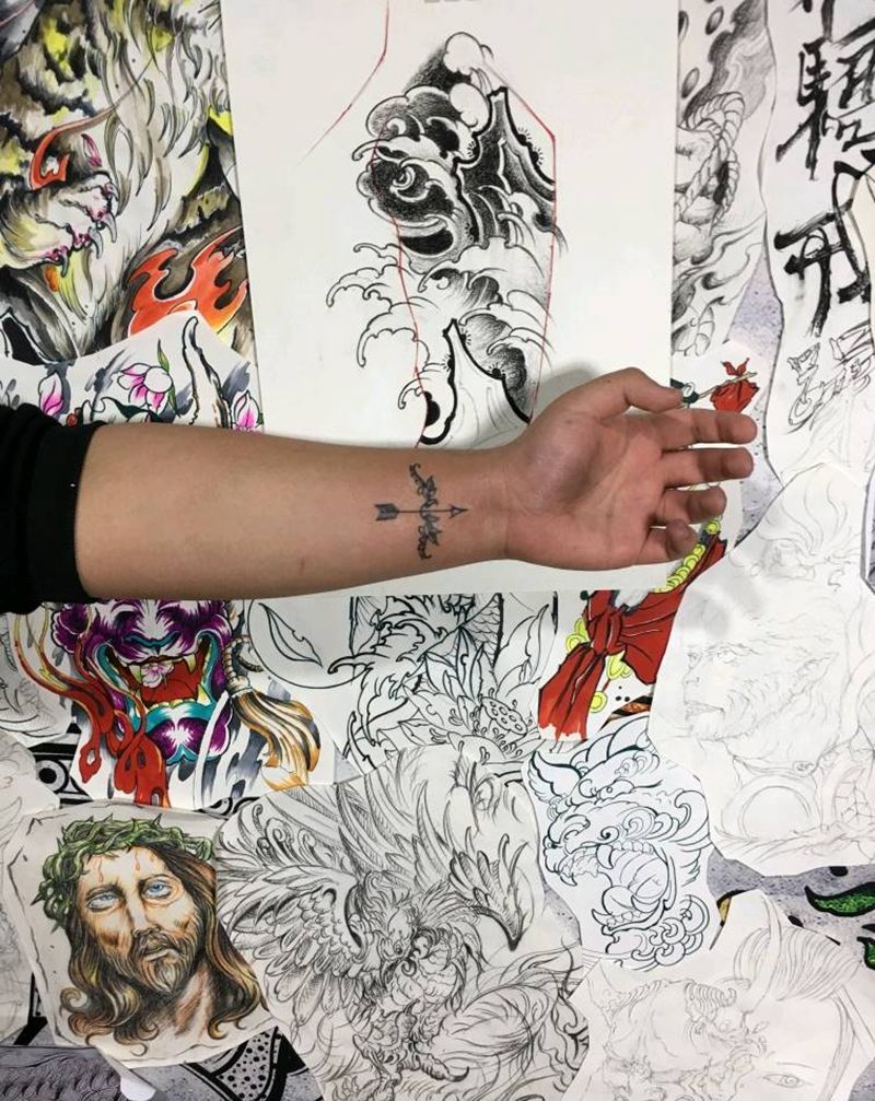 弓箭纹身图片_手臂纹身图案