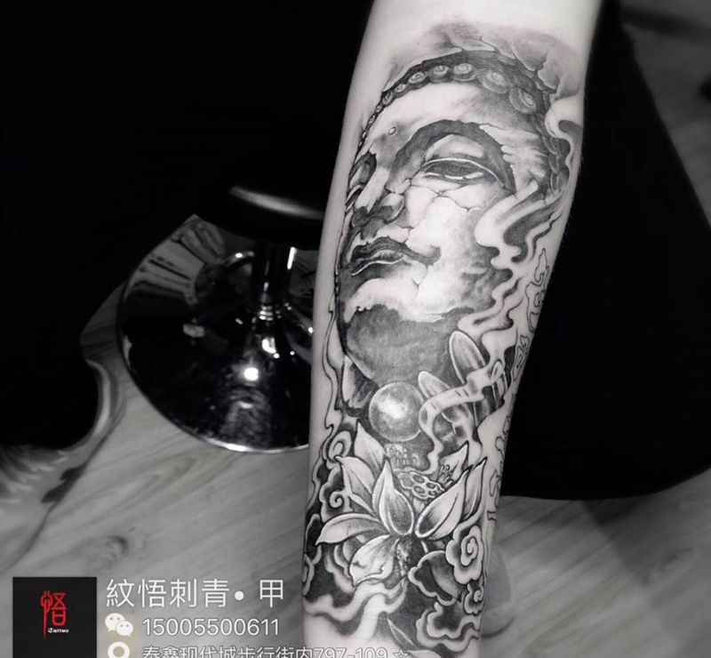 佛头纹身图片_手臂成品传统写实宗教人物纹身图案