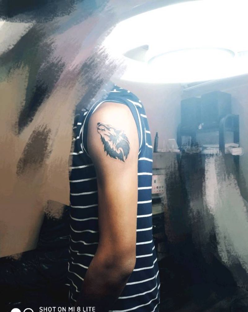 客人自带图  图腾狼头纹身图片_手臂图腾狼头纹身图案