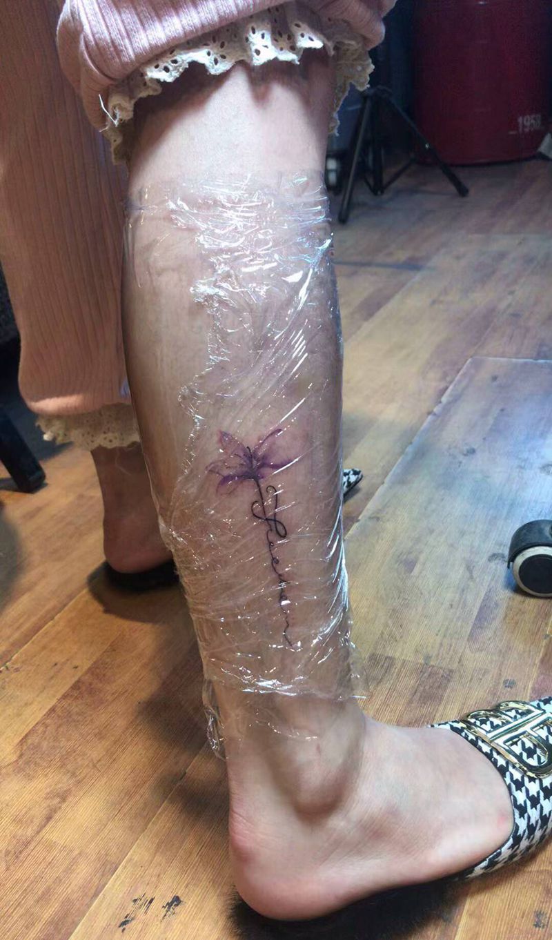 e纹身图片_腿部水墨纹身图案