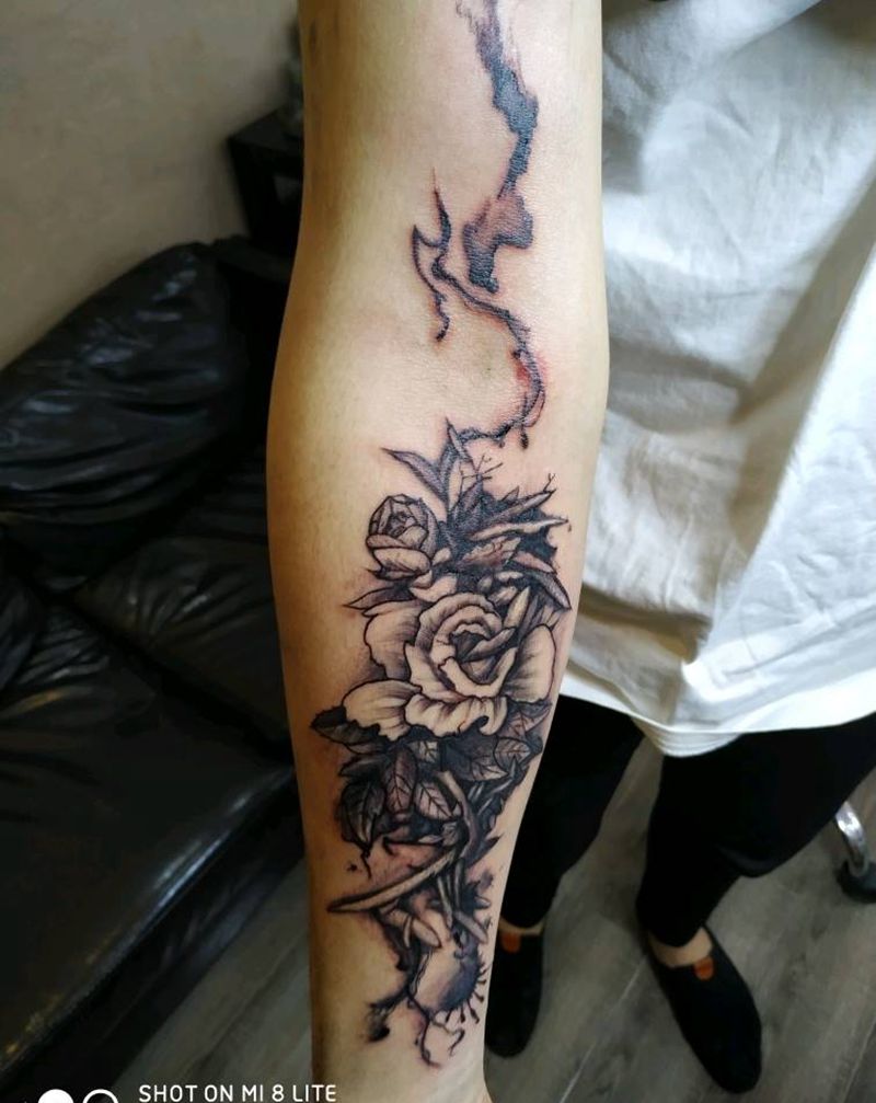 水墨花纹身图片_手臂水墨水墨手臂纹身图案