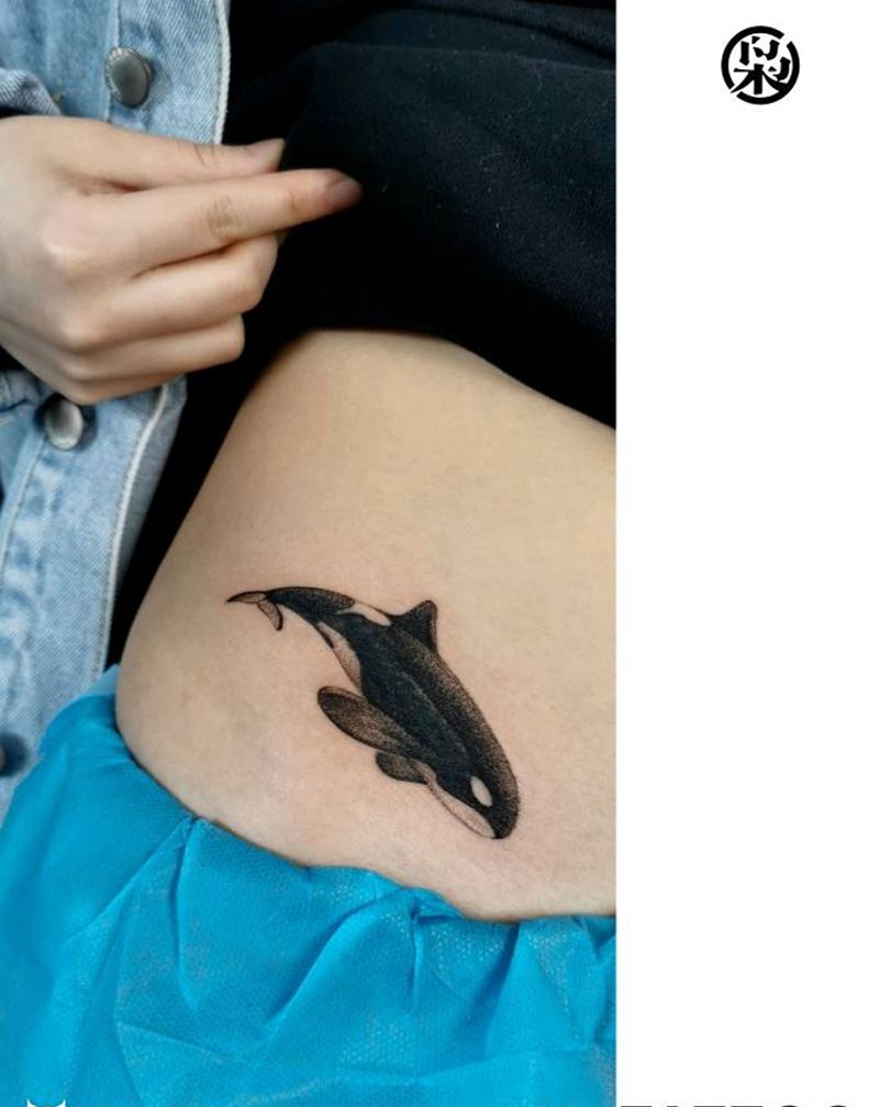 遮盖作品纹身图片_腰部点刺纹身图案