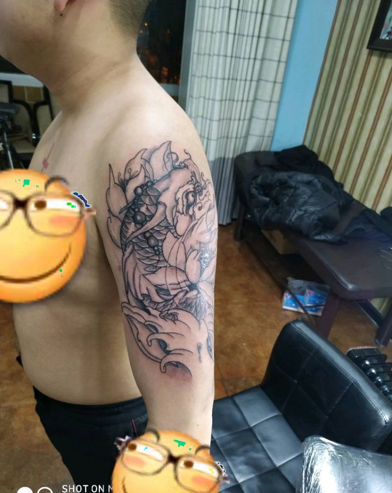 大臂龙鱼纹身图片