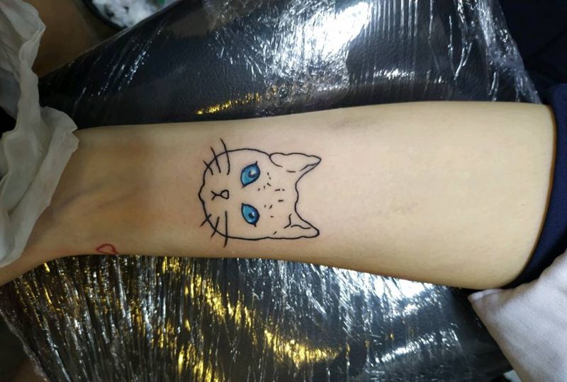 小猫咪纹身图片_手臂猫妹子纹身图案