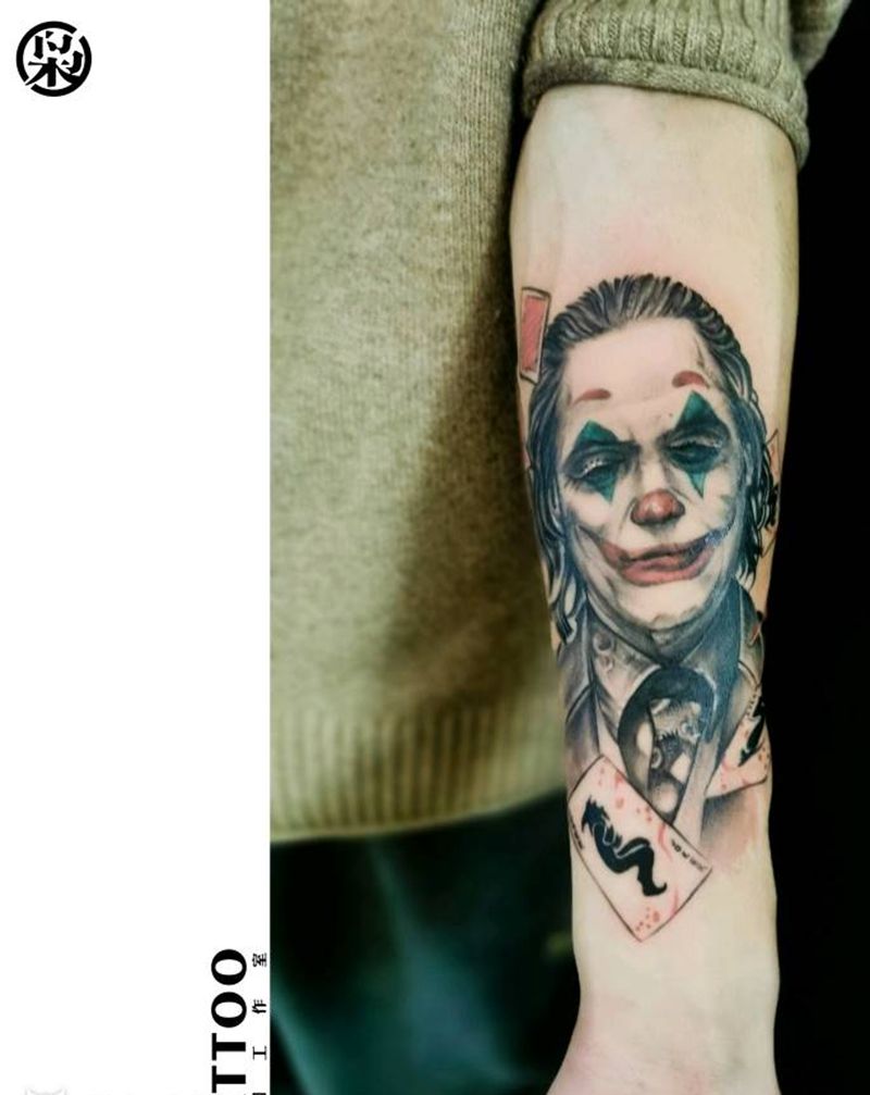 杰昆2019小丑纹身图片_手臂欧美写实纹身图案