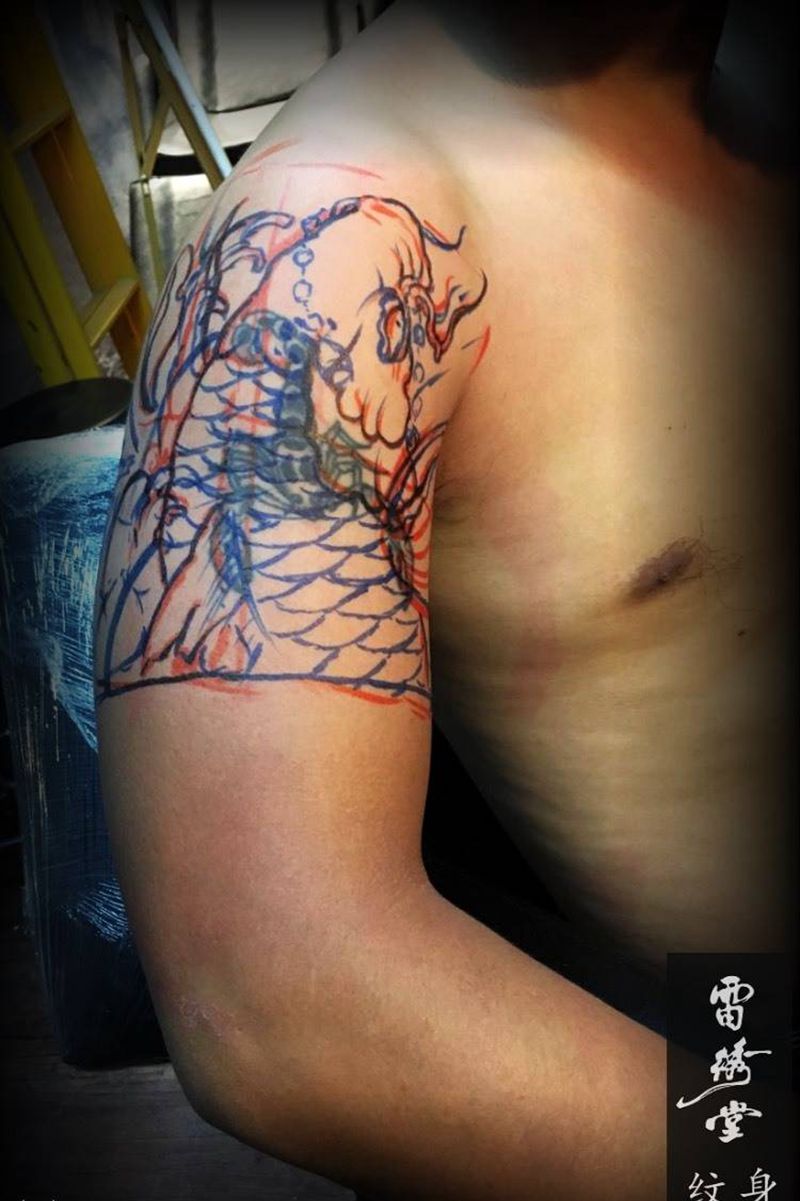 鲤鱼遮盖纹身图片