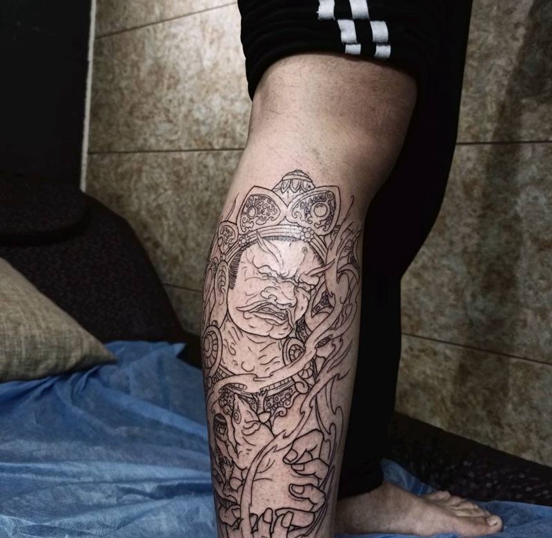 黄财神线条纹身图片_腿部新传统黄财神纹身图案