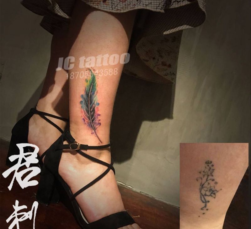 羽毛遮盖纹身图片