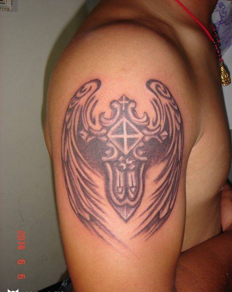 羽毛十字架纹身图片