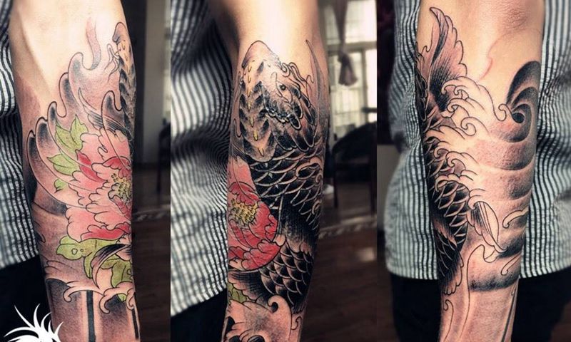 包小臂遮盖纹身图片