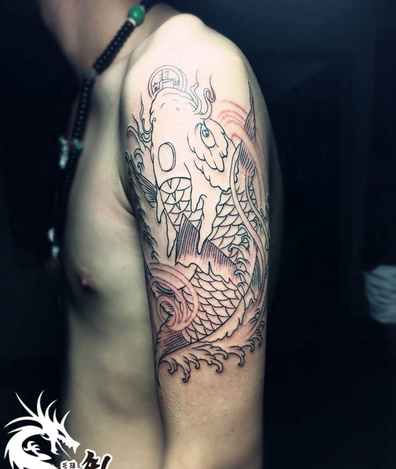 大臂鳌鱼割线纹身图片