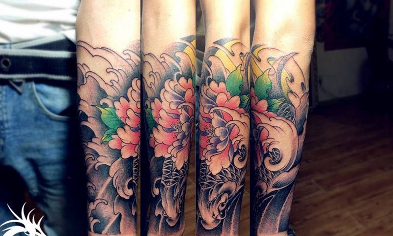 小臂鲤鱼纹身图片