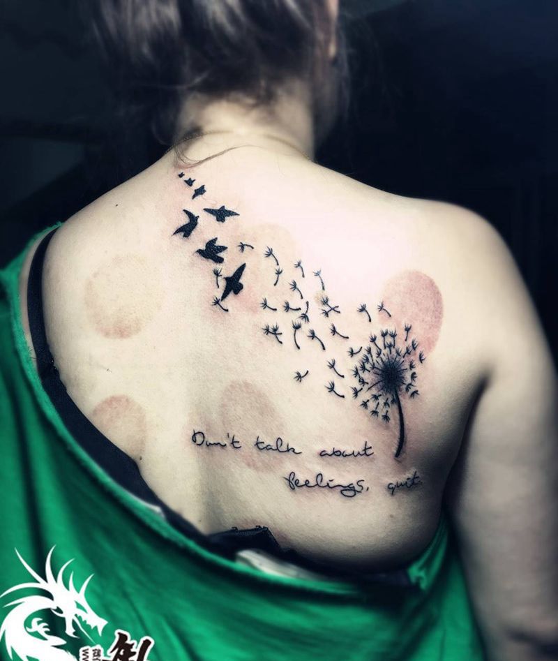 美女后背蒲公英纹身图片