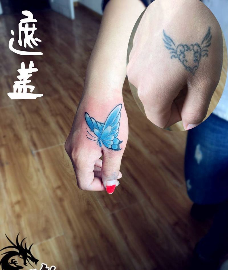 手部遮盖纹身图片