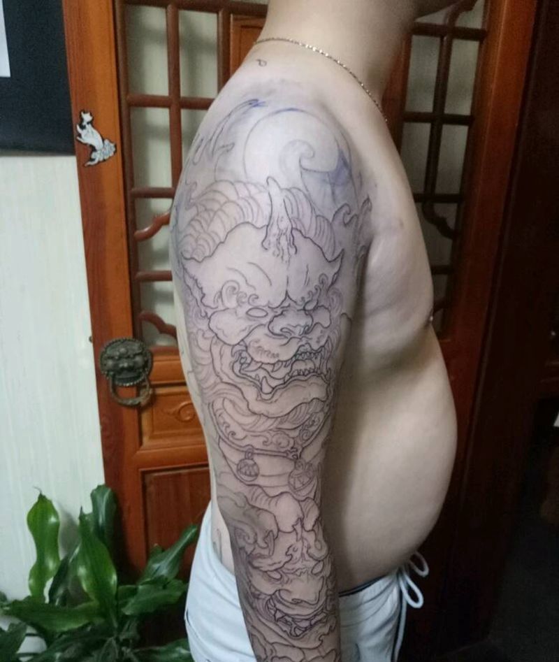 唐狮牡凡花臂纹身图片