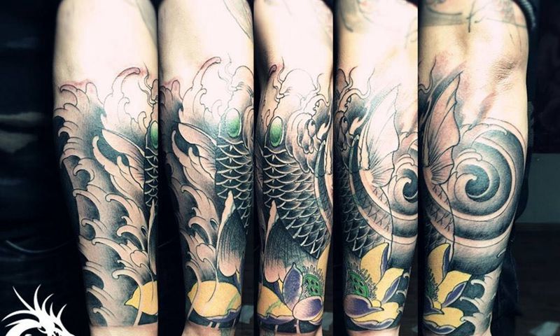 小臂鲤鱼纹身图片