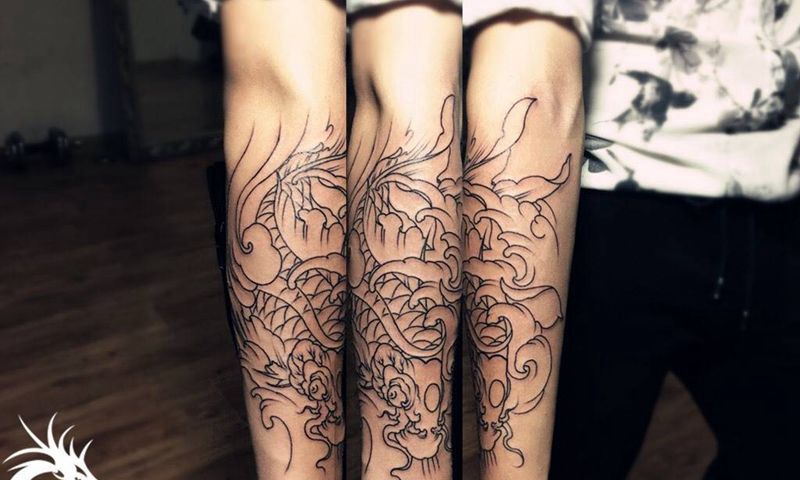 小臂鲤鱼割线纹身图片