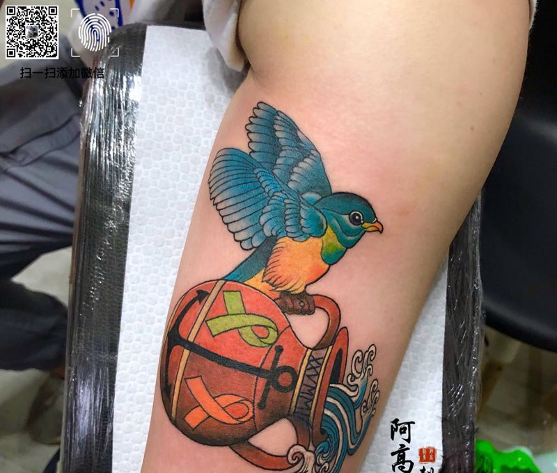 水瓶座纹身纹身图片_手臂New School纹身图案