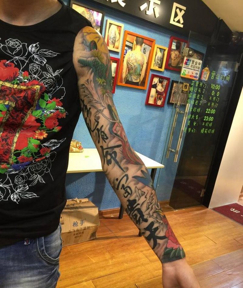 传统彩色龙飞凤舞花臂纹身图片_成品手臂传统动物原创纹身图案