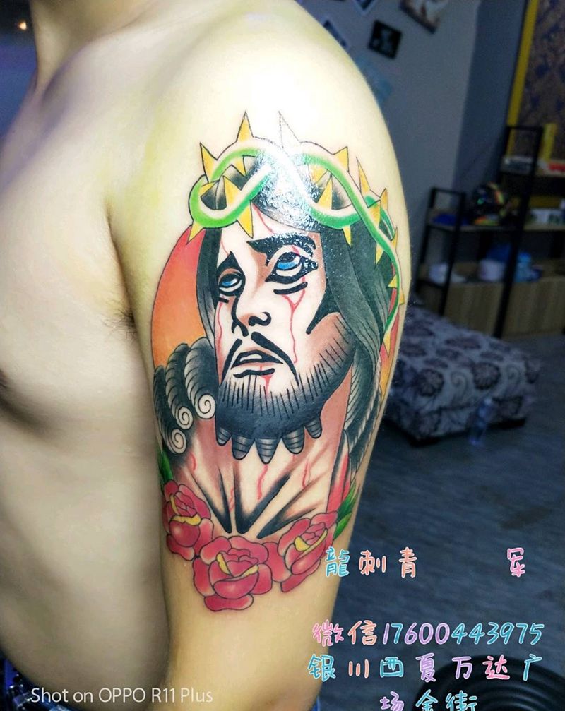 耶稣纹身图片_手臂纹身图案