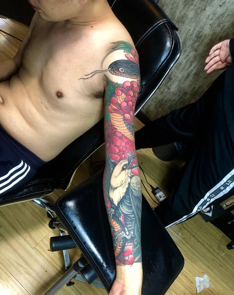 花臂蛇纹身图片