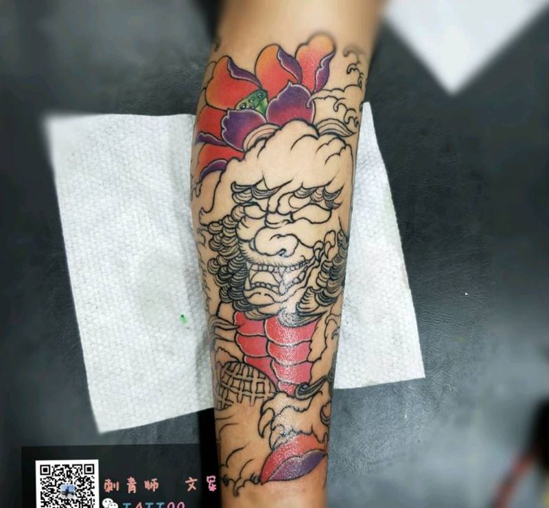 唐狮纹身图片_腿部纹身图案