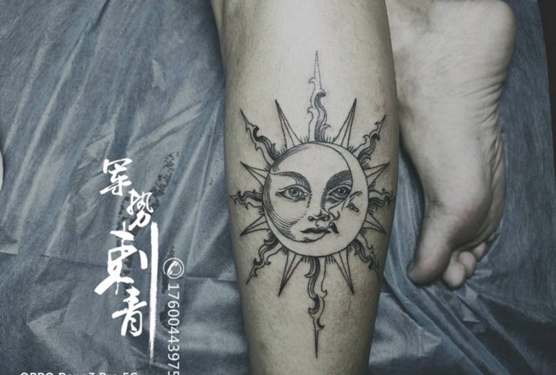 太阳纹身图片_腿部纹身图案