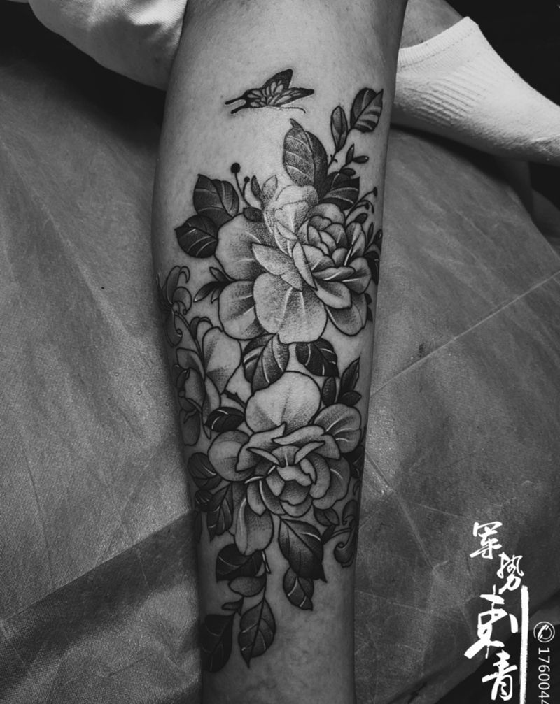 素花纹身图片_腿部纹身图案