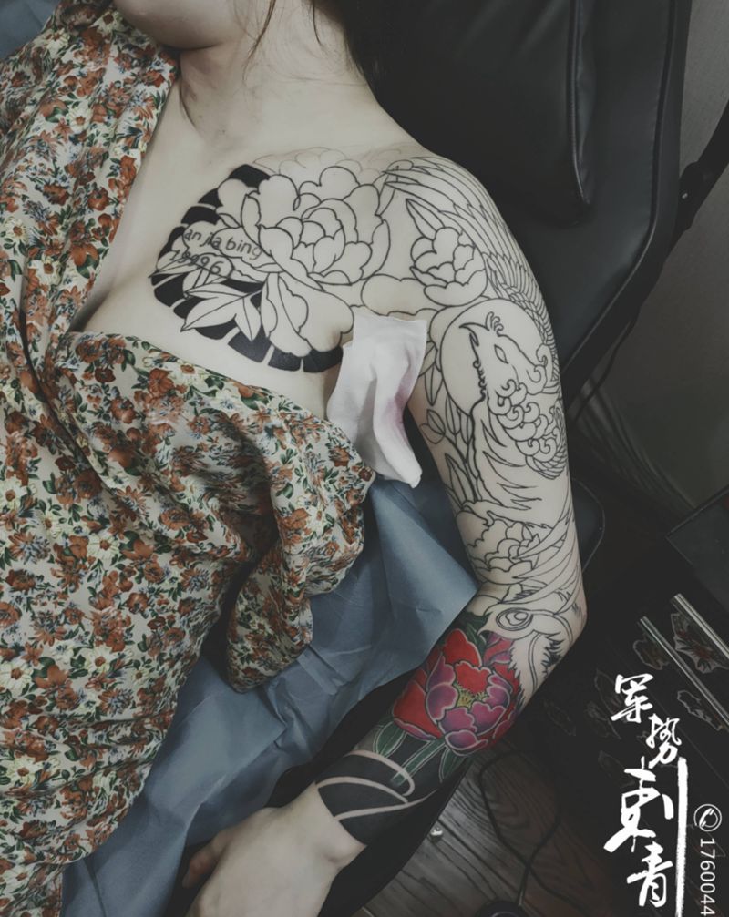 凤凰牡丹纹身图片_手臂纹身图案