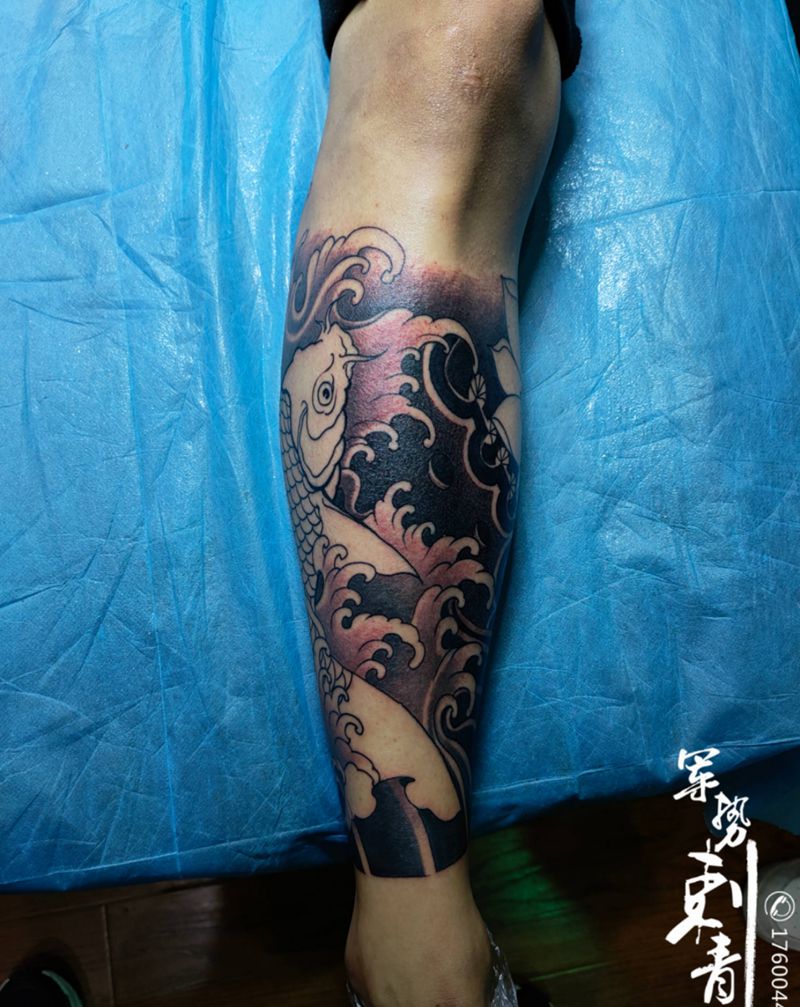 鱼纹身图片_腿部纹身图案