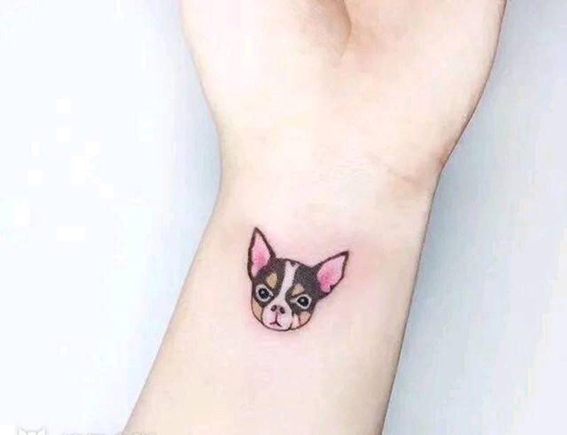 犬头。纹身图片_手臂纹身图案