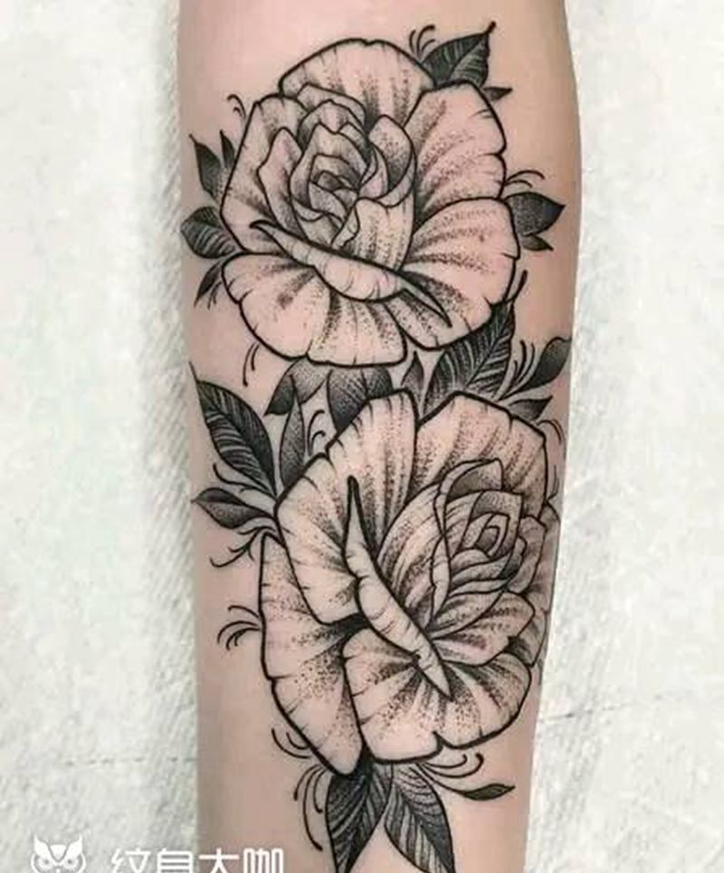 玫瑰花叶。纹身图片_手臂纹身图案