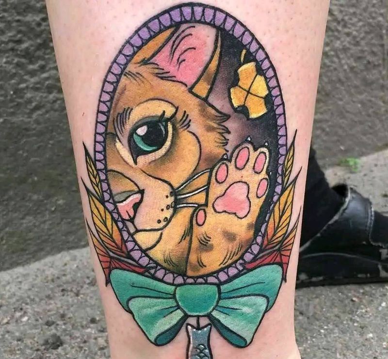 镜子狮子。纹身图片_腿部纹身图案