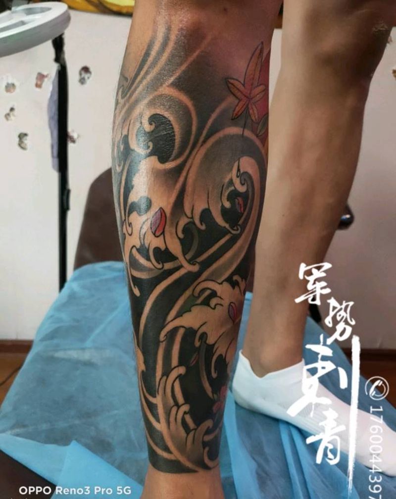 浪纹身图片_腿部纹身图案